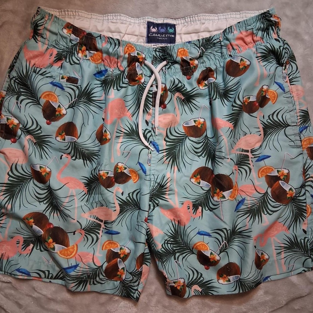 Charleston Threads multi colored swim shorts flamingos coconuts